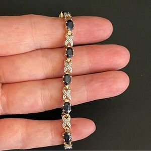 Elegant gold over 925 s silver genuine sapphire XO style Bracelet.